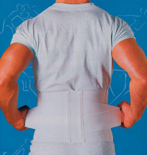 Man with white back brace white shirt and pants on blue background